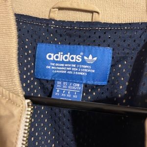 Adidas jacket . Size XS